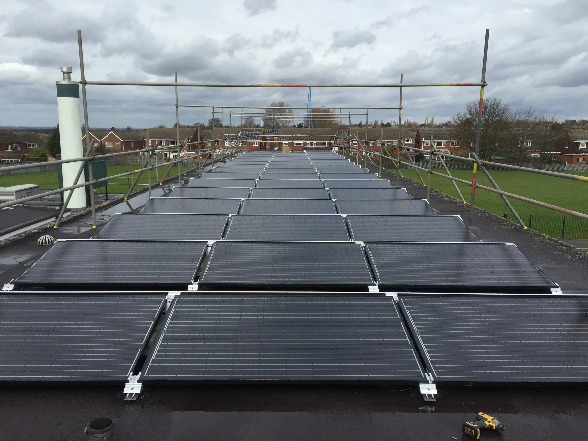 Scaffolding providing safe access around a commercial flat roof