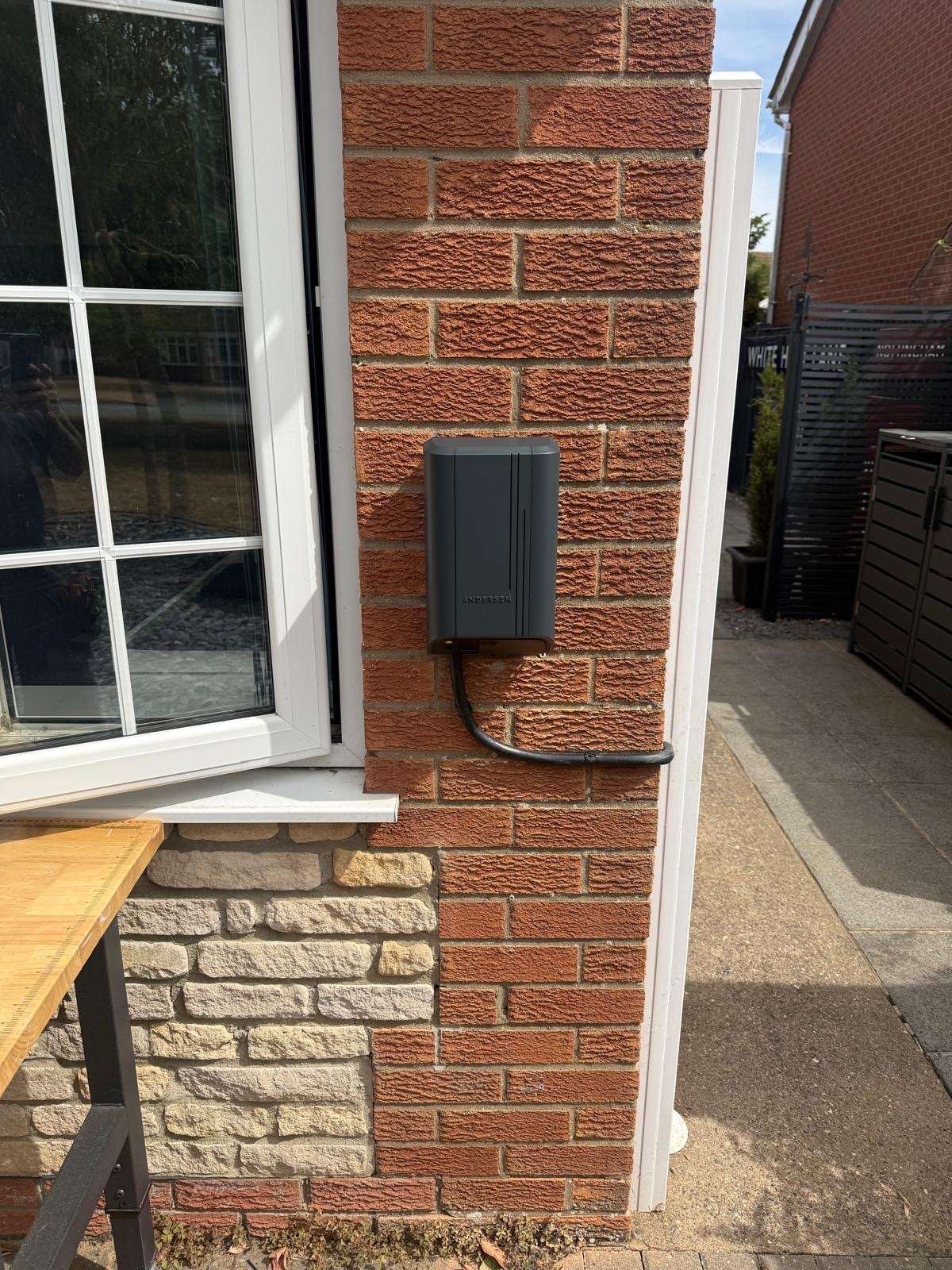 Andersen 7kW electric vehicle charge point installed on a house wall in Woodhall Spa