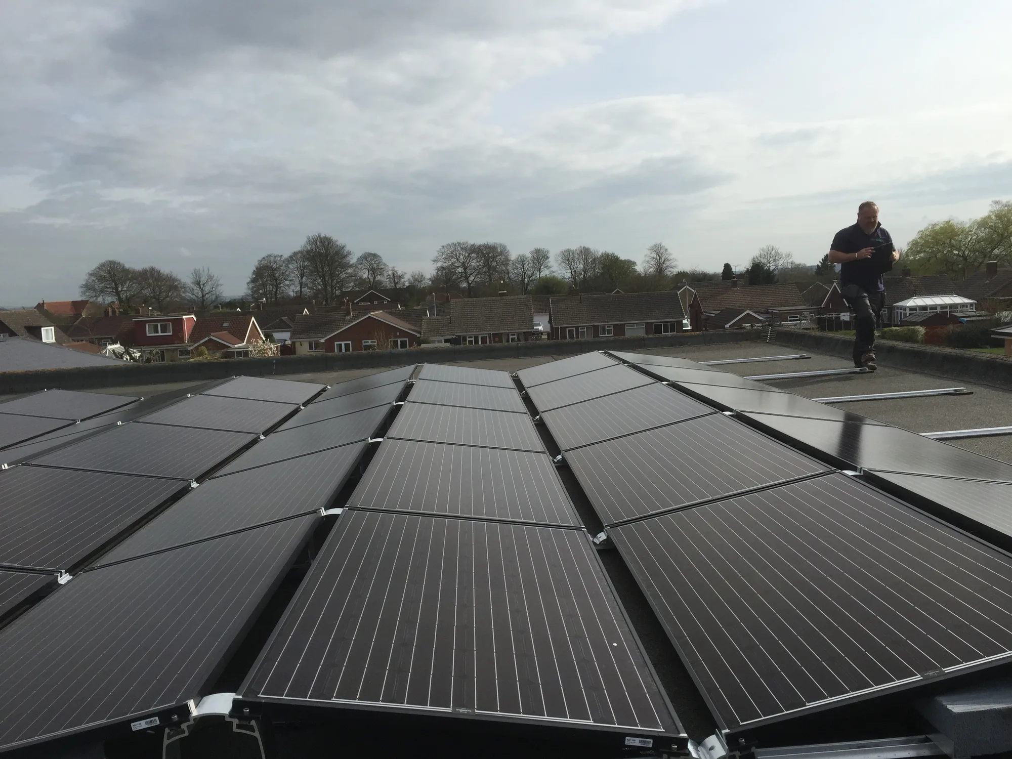 Rows of solar panels on a commercial flat roof
